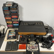 Atari 2600 System Bundle with Console 33 Games Joystick Paddles Manuals Untested