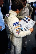 Gilles Villeneuve reads a magazine Dutch GP at Zandvoort August 30- Old Photo 1