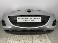 Mazda 2 2010-2012 FL Front Bumper Complete & Grills Silver (will need respray)