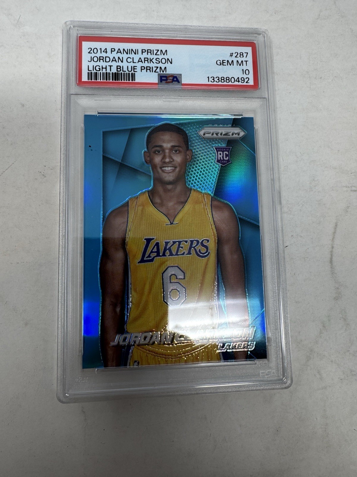 2014-15 Knicks Prizm Light Blue Prizm 12/49 Jordan Clarkson 287 Rookie RC PSA 10