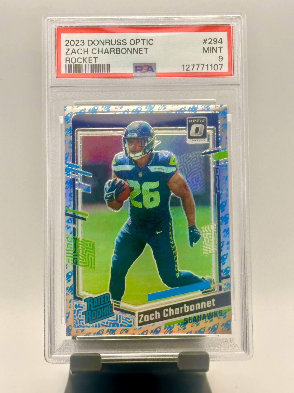 2023 Donruss Optic Zach Charbonnet Rocket Emoji Prizm Rated Rookie #294 PSA 9