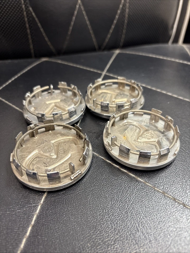 4 tapas centrales de llantas genuinas OEM INFINITI G35 M35 G37 Q60 Foto 4 de 4