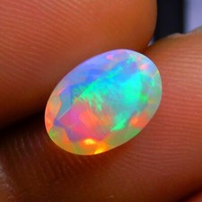 Faceted AAA Quality Ethiopian Opal Loose Oval Gemstone Size 10.6x7.6x4mm 1.55ct