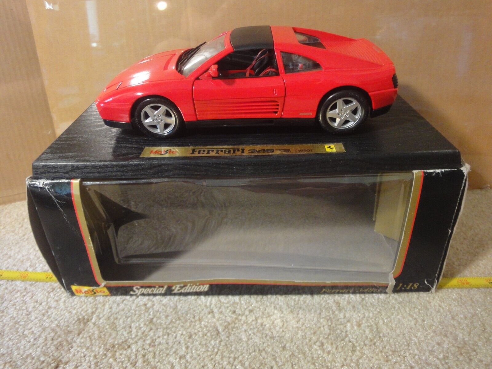 Maisto 1990 Ferrari 348 TS supercar, 1/18 scale red diecast model car.