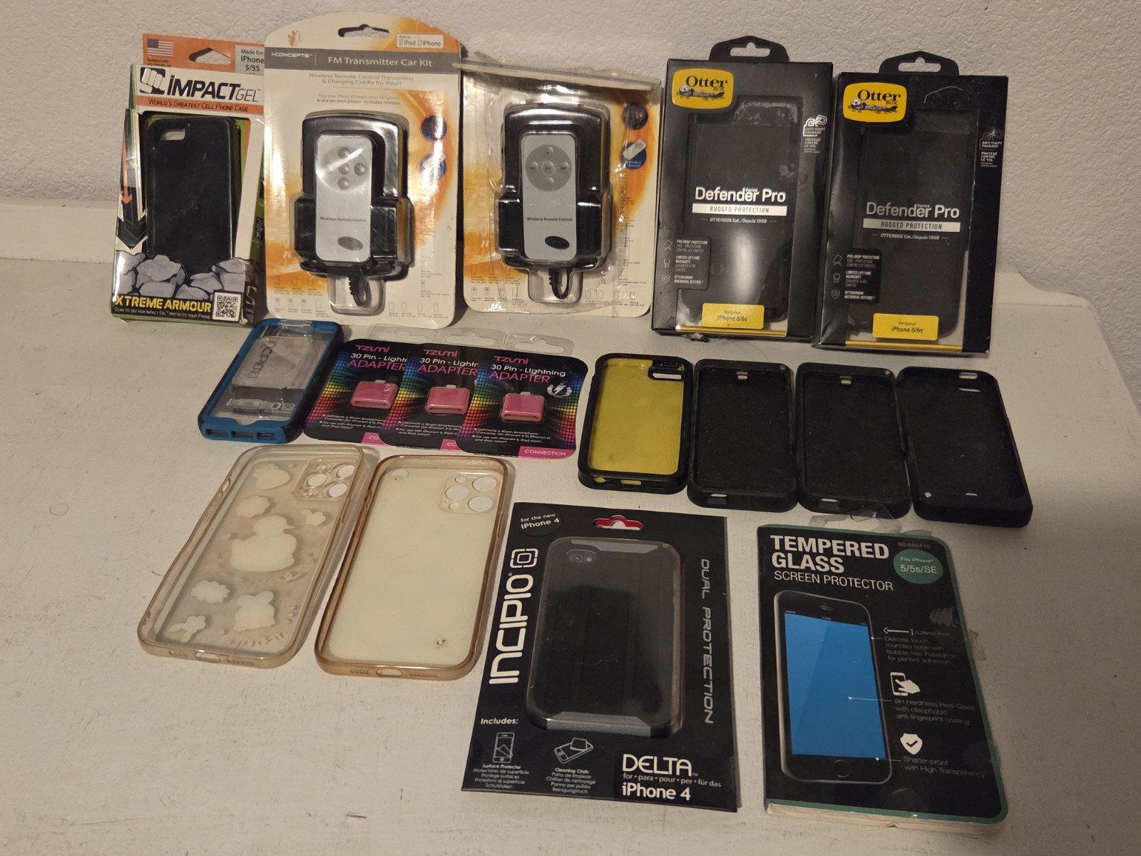 IPhone cases 4,5,6,15  &FM TRANSMITTER CAR KIT FOR IPOD 30 p