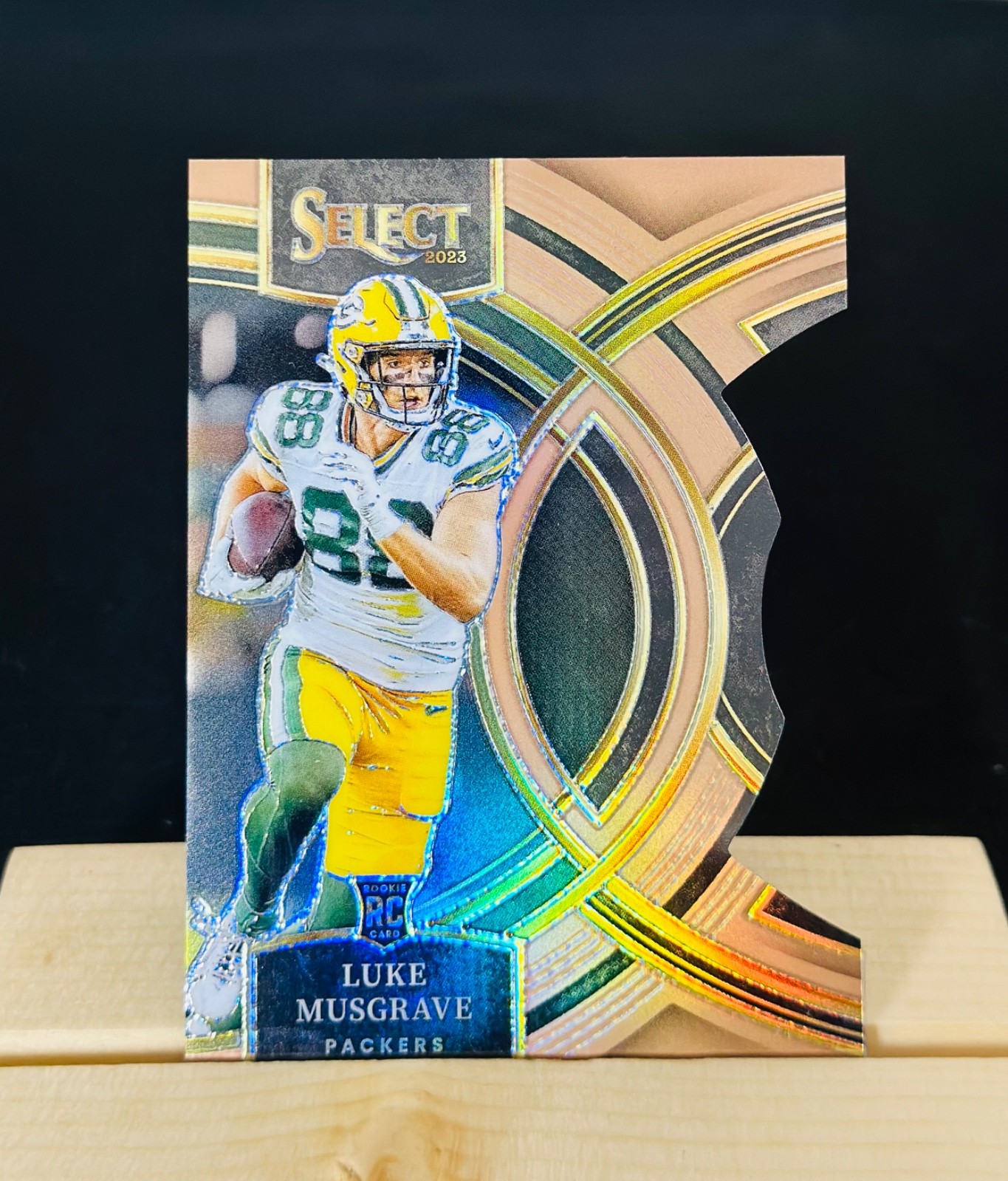 2023 Panini Select - Premier Level Luke Musgrave #166 Copper Prizm Die-Cut /299