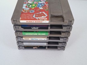 Lotto di 24 giochi Nintendo NES; Bubble Bobble, Adventure Island, Lolo, Paperboy