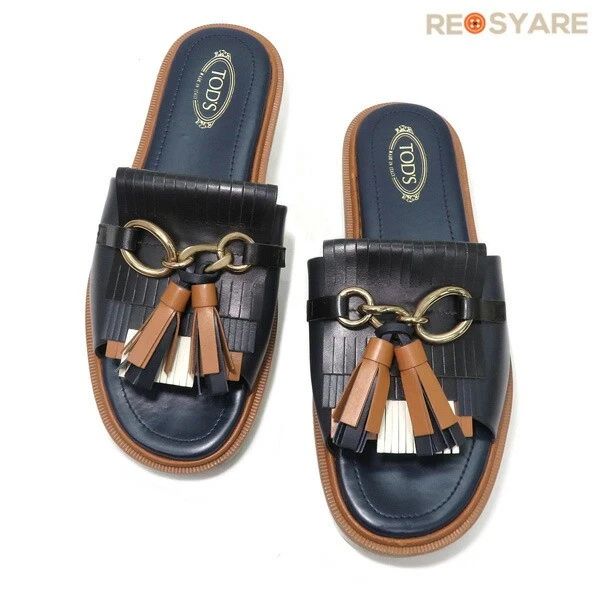 TOD’S TOD'S sandali slide in pelle nappa con frange 46843