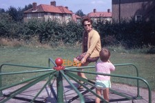 35mm Slide - Woman And Young Girl On Playground Roundabout, 1968