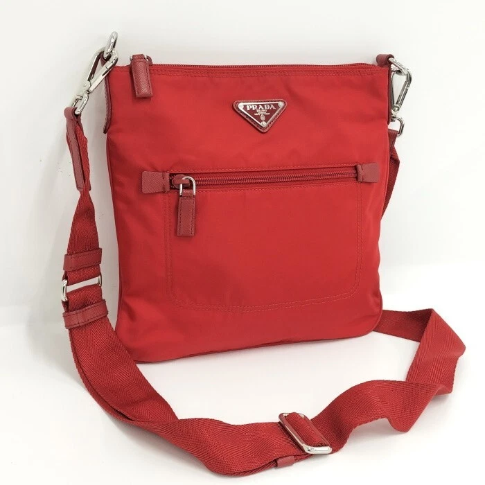 prada man bag red logo