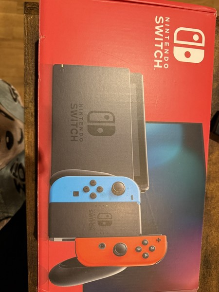 Nintendo Switch Consola Portátil con Joy-Con Azul Neón y Rojo Neón - Negra.