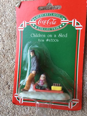 COCA COLA AMERICAN CLASSICS KINDER AUF EINEM SCHLITTEN 1995 NEU VERSIEGELT BLISTERPACKUNG