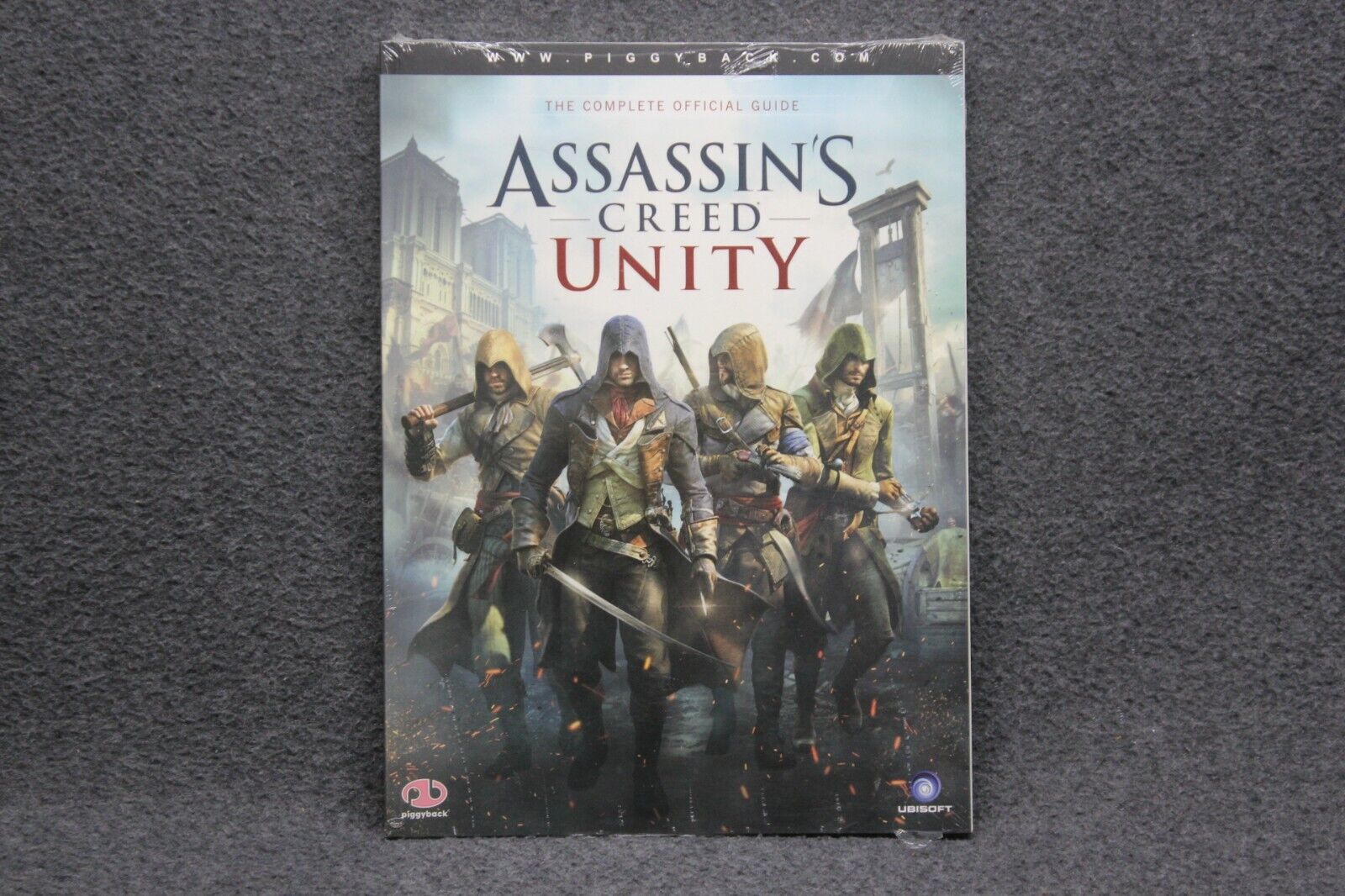 Assassin's Creed Unity: Prima Official Game Guide: Piggyback:  9780804163408: : Books