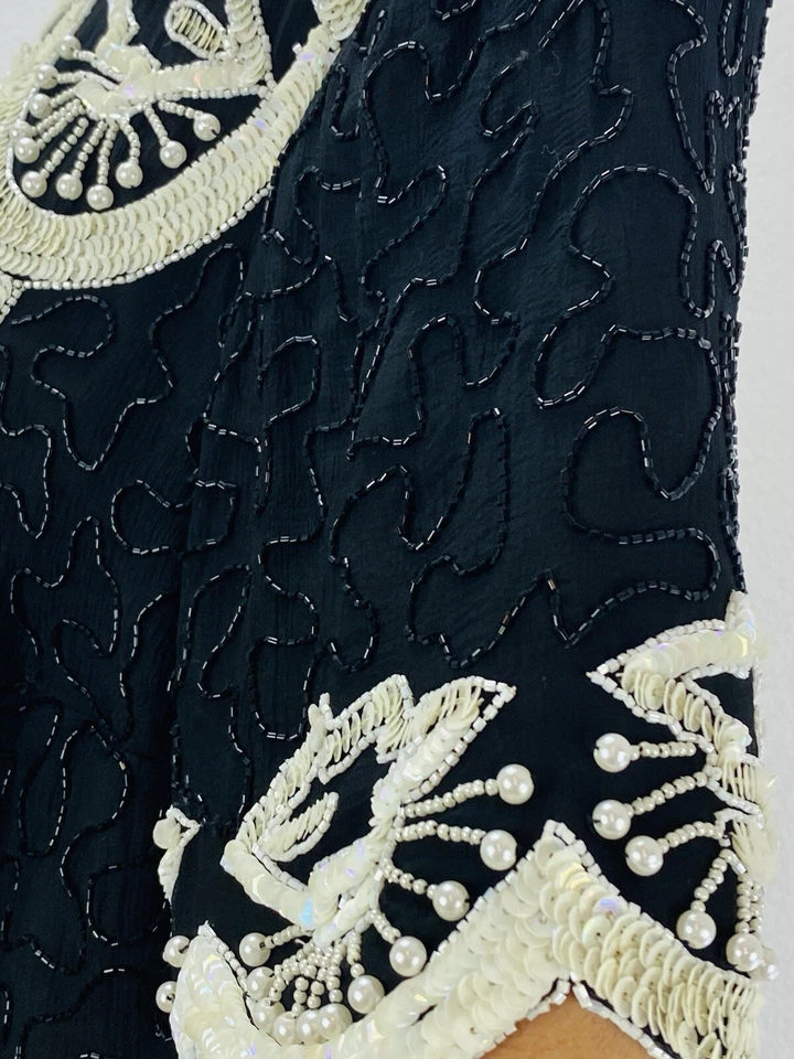 Blusa de lentejuelas Roaman’s para mujer negra con cuentas blancas talla X-grande Foto 4 de 4