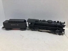 Marx 666 2-4-2 steam locomotive with Santa Fe tender O Gauge Postwar