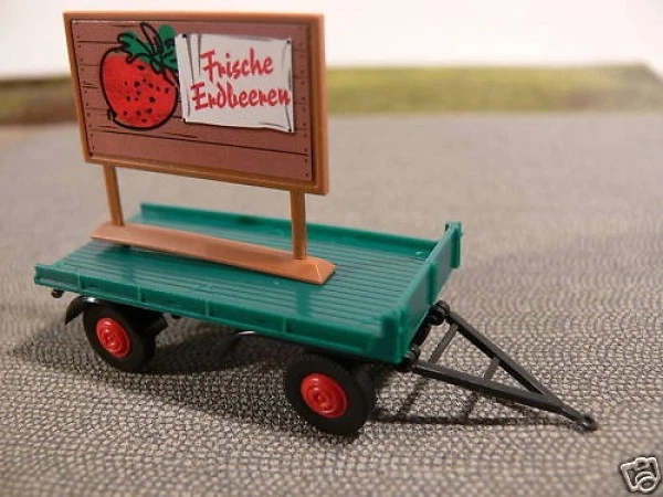 1/87 Brekina 2-Achs Anhänger mit Werbetafel Erdbeeren 55234 - Bild 1 von 1