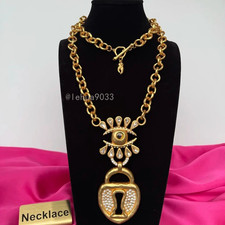 Brand New Schiaparelli Keyhole Necklace with Box and Dust Bag