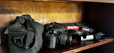 Canon EOS 1300D DSLR Camera (with 18-55mm Lens) + Tripod & Case.