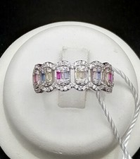 ANELLO VERETTA IN ORO BIANCO 18 KT. TIT. 750 CON ZAFFIRI RUBINI E BRILLANTI.