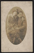 Photo:1910s Soldier in Uniform with Woman on Lap Studio Portrait