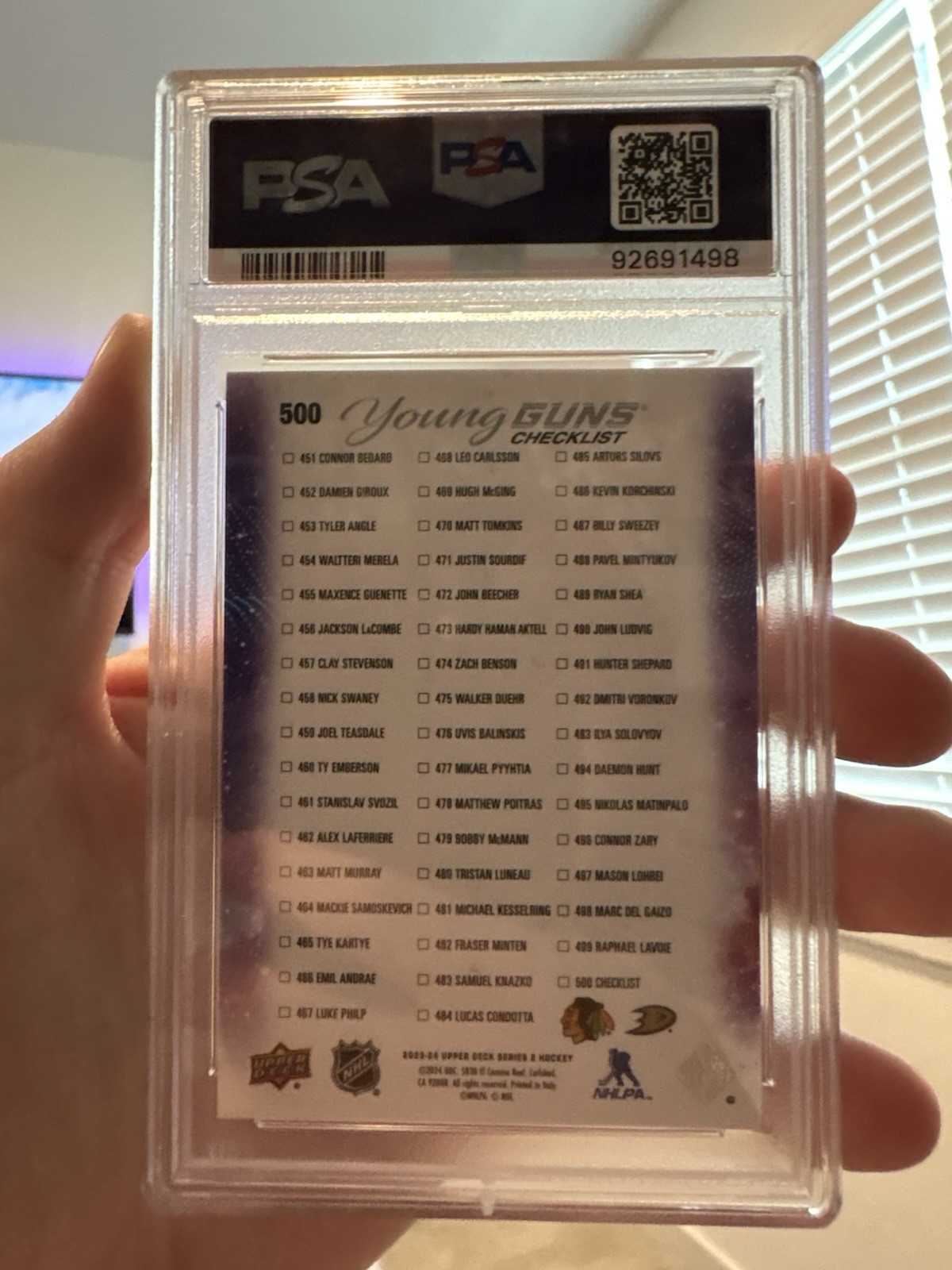 2023 Upper Deck Young Guns Connor Bedard Leo Carlsson Psa 10 view 2