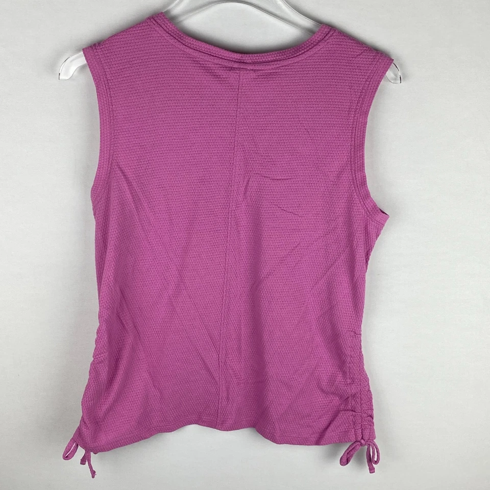 Top deportivo RBX Activewear para mujer sin mangas rosa estampado elevado lados ajustables Foto 3 de 4
