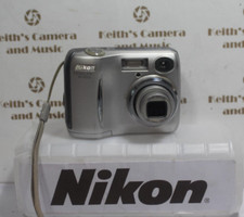 Parts or repair: NIKON COOLPIX 4100 Digital Camera Good battery door /power/lens