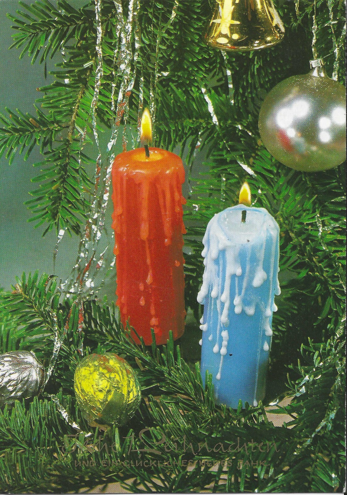 17135 - Postcard showing lit candles on a christmas tree