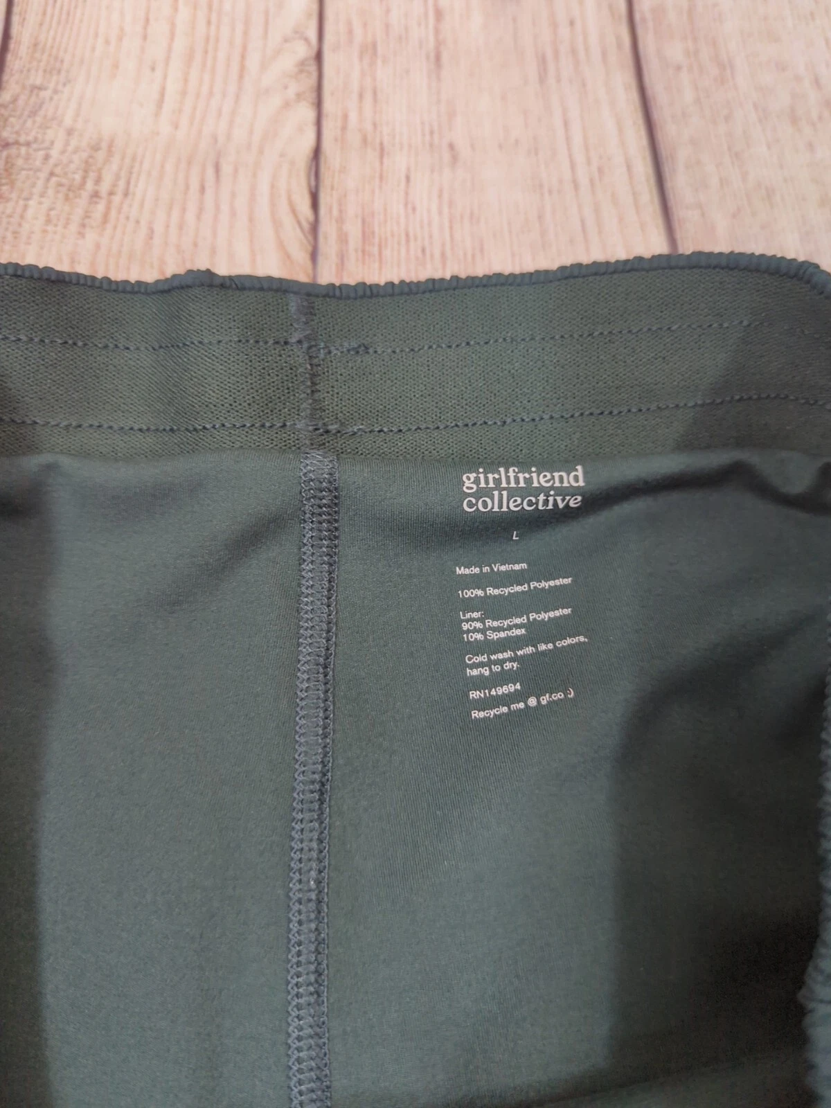 girlfriend-collective moss trail athletic pockets read shorts