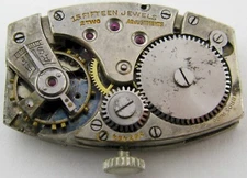vintage FHF tonneau shaped 15 jewels 2 adj. watch movement for parts