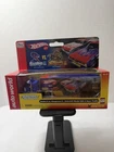 SLOT CAR AUTOWORLD XTRACTION SNAKE II VS. MONGOOSE II PETERBILT 359 RACE TRAILER
