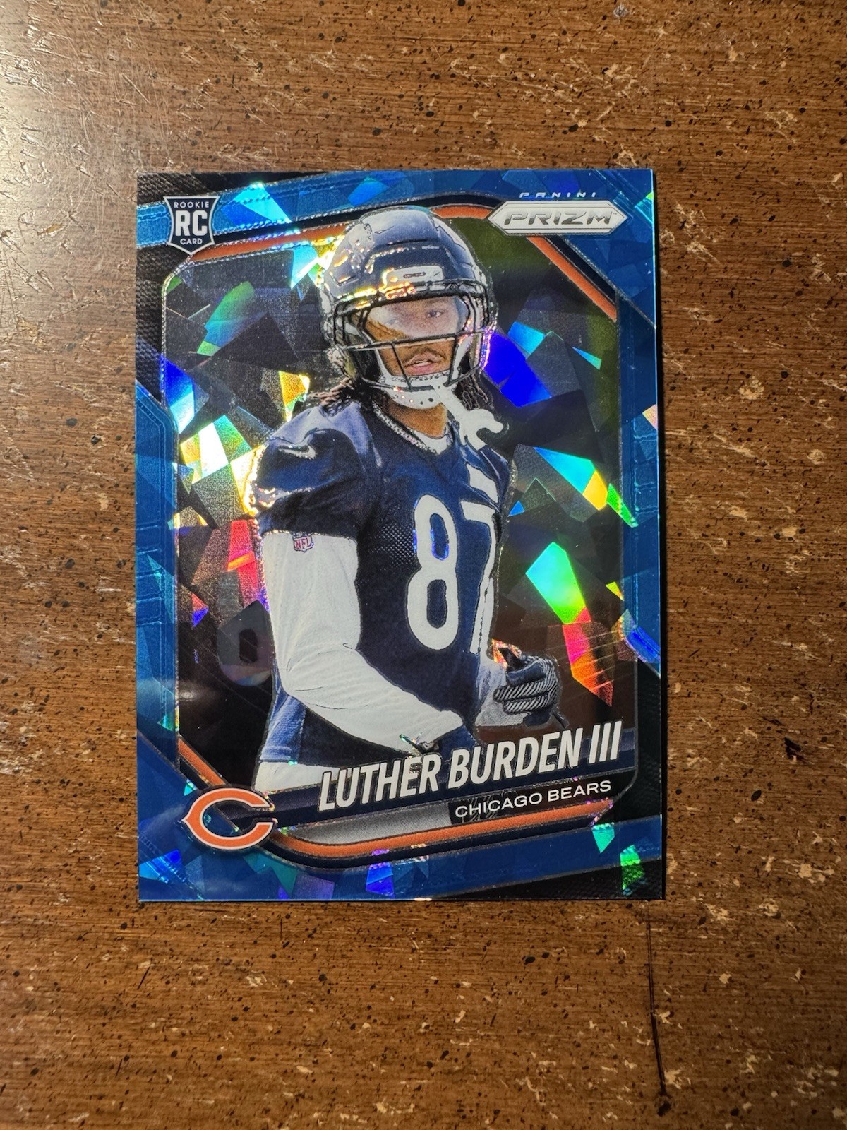 2025 Panini Prizm Football Luther Burden #331 Blue Ice Prizm /99 (RC)