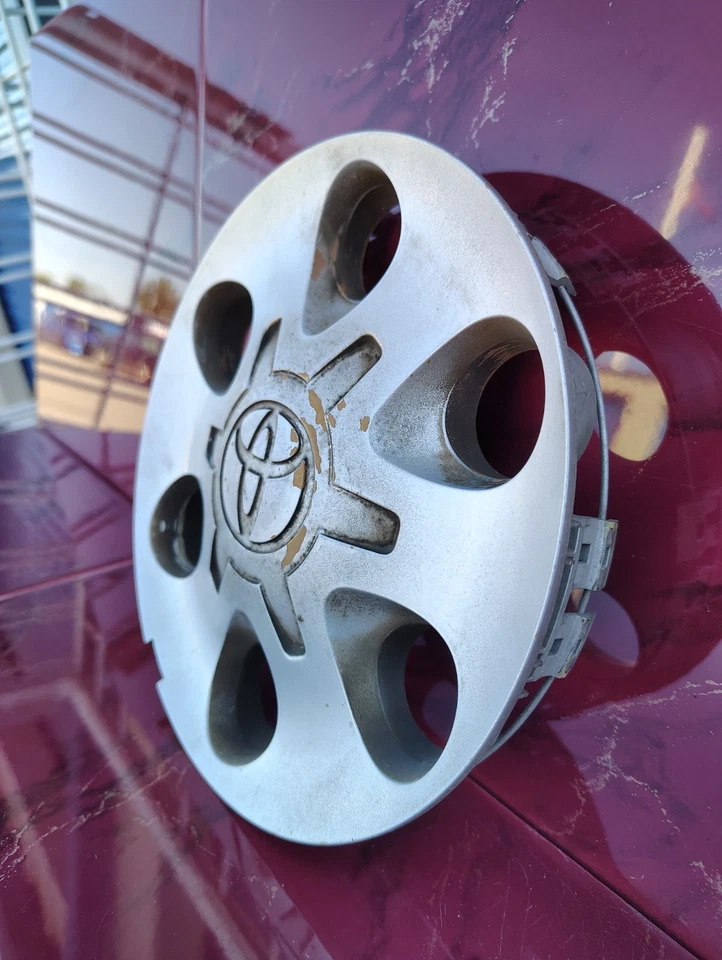 Tapa central de rueda Toyota Tundra Sequoia 2000-2004 (1) plateada OEM # 42603-0C030 Foto 4 de 4