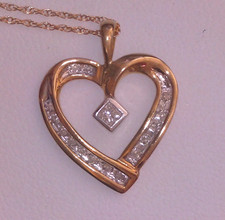 Genuine 0.16ctw Diamond 10K Yellow Gold Open Heart Pendant Necklace - 18"