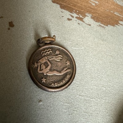 1970s Vintage 1.25  Aquarius Medallion Pendant Horoscope Astrology Jan Feb Brass