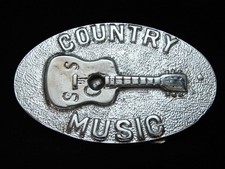 OG03112 NOS VINTAGE 1970s COUNTRY MUSIC CHROME OVER SOLID BRASS BARON BUCKLE