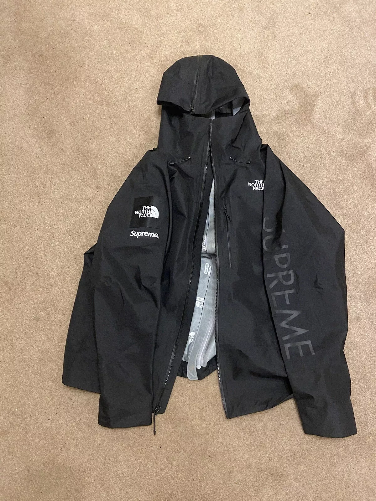 Veste noire coque en couture ruban Supreme The North Face (taille XL)
