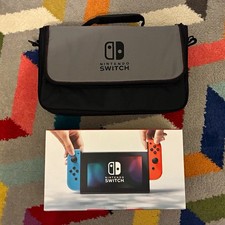 Nintendo Switch Console Handheld w/ Neon Red/Blue Joy-Con Dock Box & Carry Case