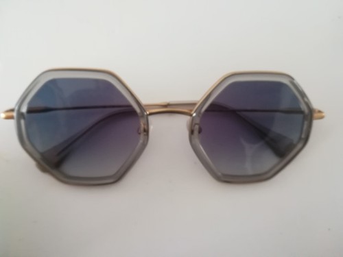 gafas de sol unisex grises, marca gigi style, nuevas, sin uso. - Imagen 2 de 2