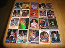 NEW YORK KNICKS BASKETBALL CARD LOT-DERRICK ROSE, PAT EWING, WILLIS REED, & MORE