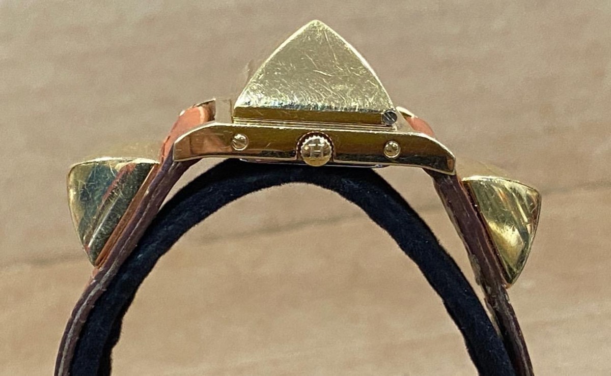 HERMES MEDOR PYRAMID GOLD STUDS WHITE DIAL 23mm QUARTZ  display picture 1