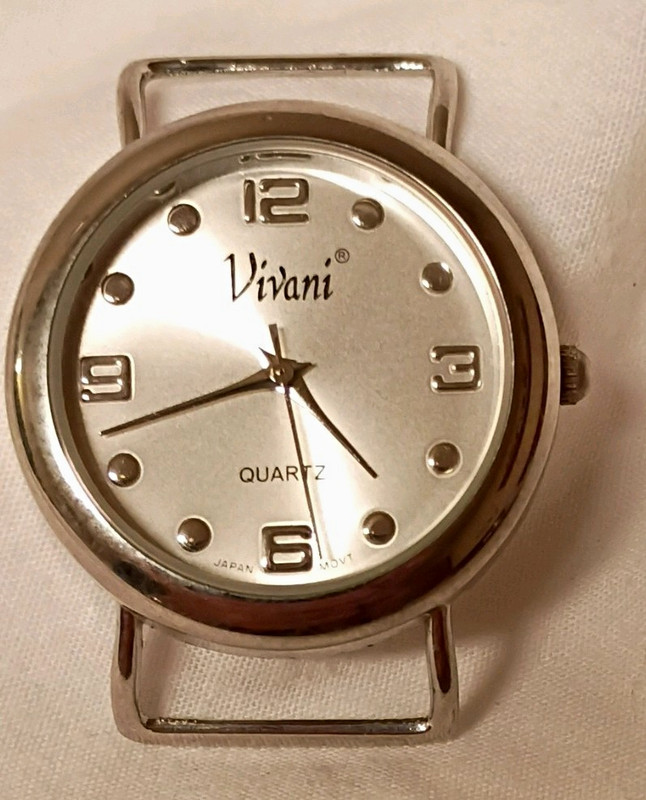 Vivani Quartz Women's Analog Dress Watch Silver Tone Arabic Dial 12-Hour No band