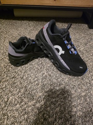 On Women's Low Top Lace-Up Athletic Sneaker Black/Gray/Blue Logo Rubber Sole