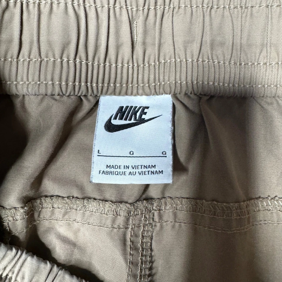 Pantalones de chándal cargo Nike para hombre tostados talla L con cordón bolsillos elásticos en la cintura Foto 4 de 4