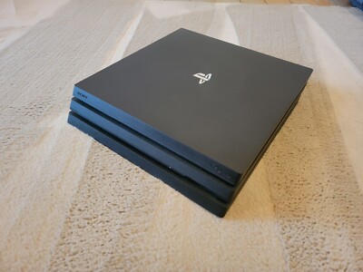 Sony PlayStation 4 Pro 500GB Black Home Console + Controller Cords And Games.