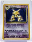 ALAKAZAM 1999 POKEMON BASE RARE HOLO 1/102 Q6233