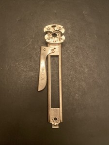 Gilhoolie jar and bottle opener, a vintage-style kitchen appliance Working Cond.