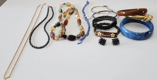 Lot of 13 Vintage and Costume Jewelry Pieces.