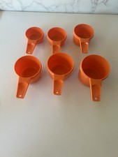 Vintage Tupperware Orange measuring cups
