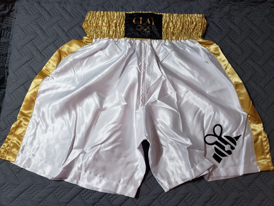 Juego de baúles de oro y guante dorado Muhammad Ali Cassius de arcilla 1960 Juegos Olímpicos Foto 4 de 4